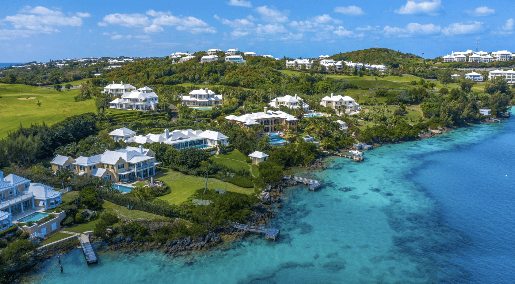 An aerial view of a resort in Bermuda, showcasing the stunning bermuda real estate.