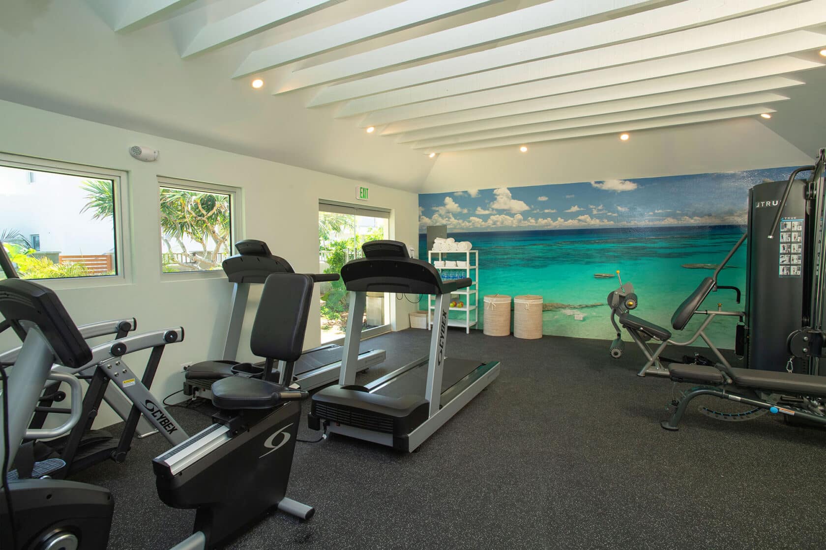 A gym room with a stunning view of the ocean at Bermuda vacation rentals.
